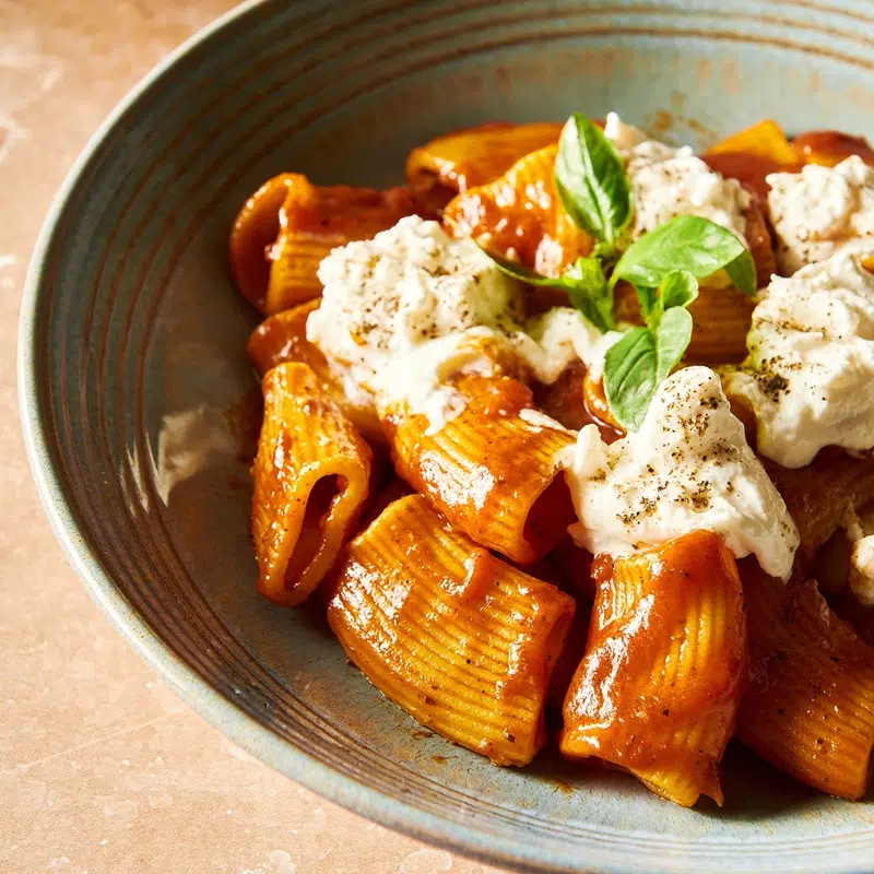 Rigatoni with egg, pomodoro rosso sauce and fresh burrata